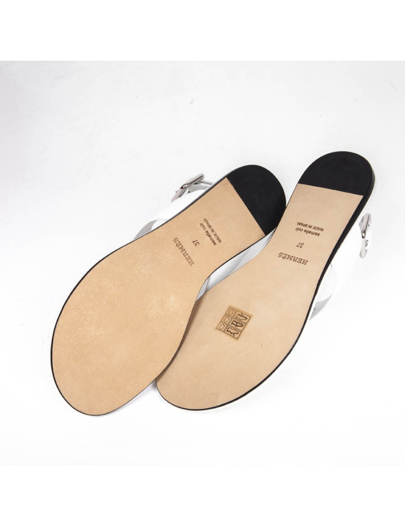 Sandales HERMES t 37 UE plate en cuir blanc H perforé