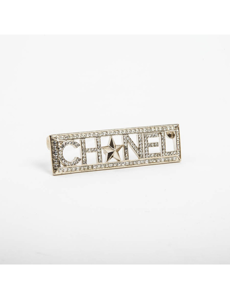 Broche "Paris-Dallas" avec strass