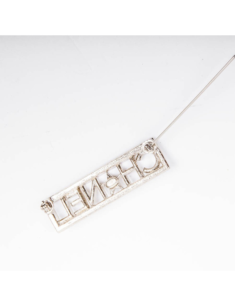 Broche "Paris-Dallas" dorée