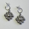 CHANEL Stud earrings in silver plated metal and two tones rhinestones