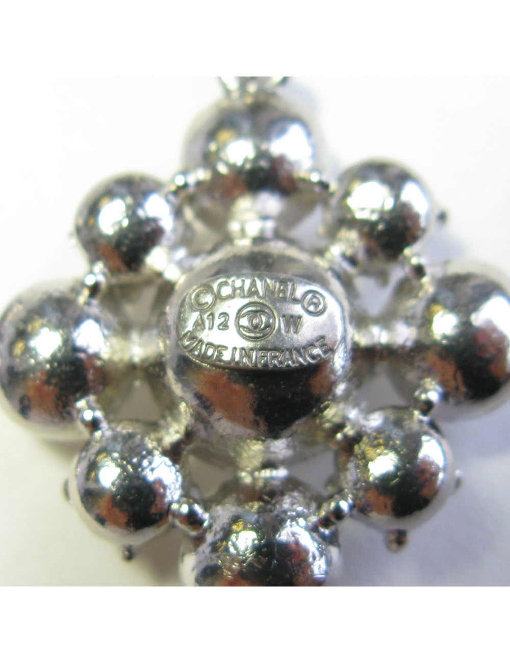 CHANEL Stud earrings in silver plated metal and two tones rhinestones