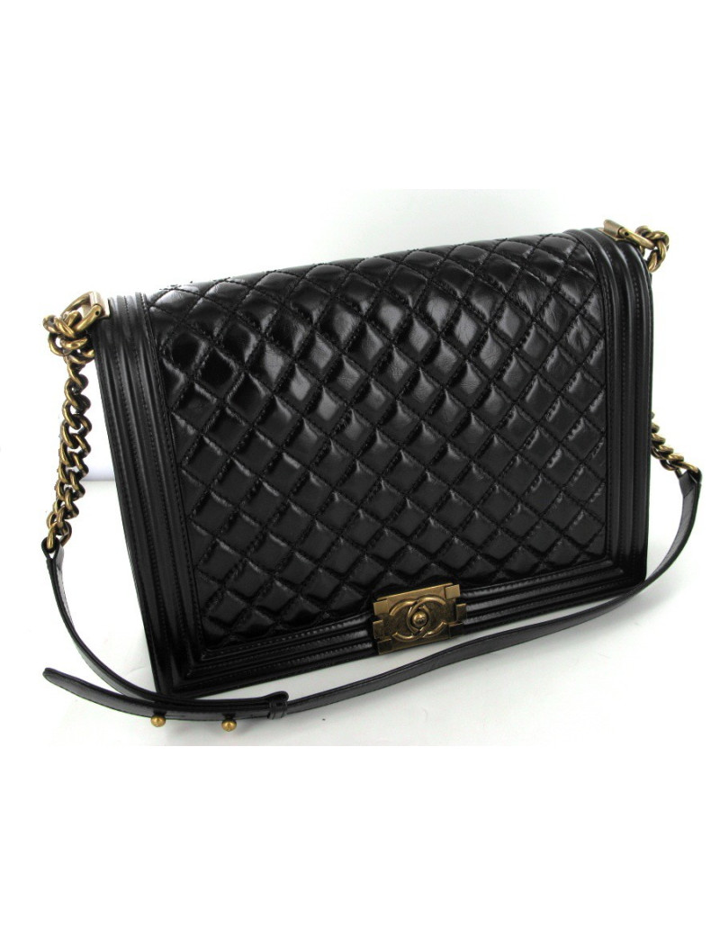 Boy GM en cuir noir brillant veilli