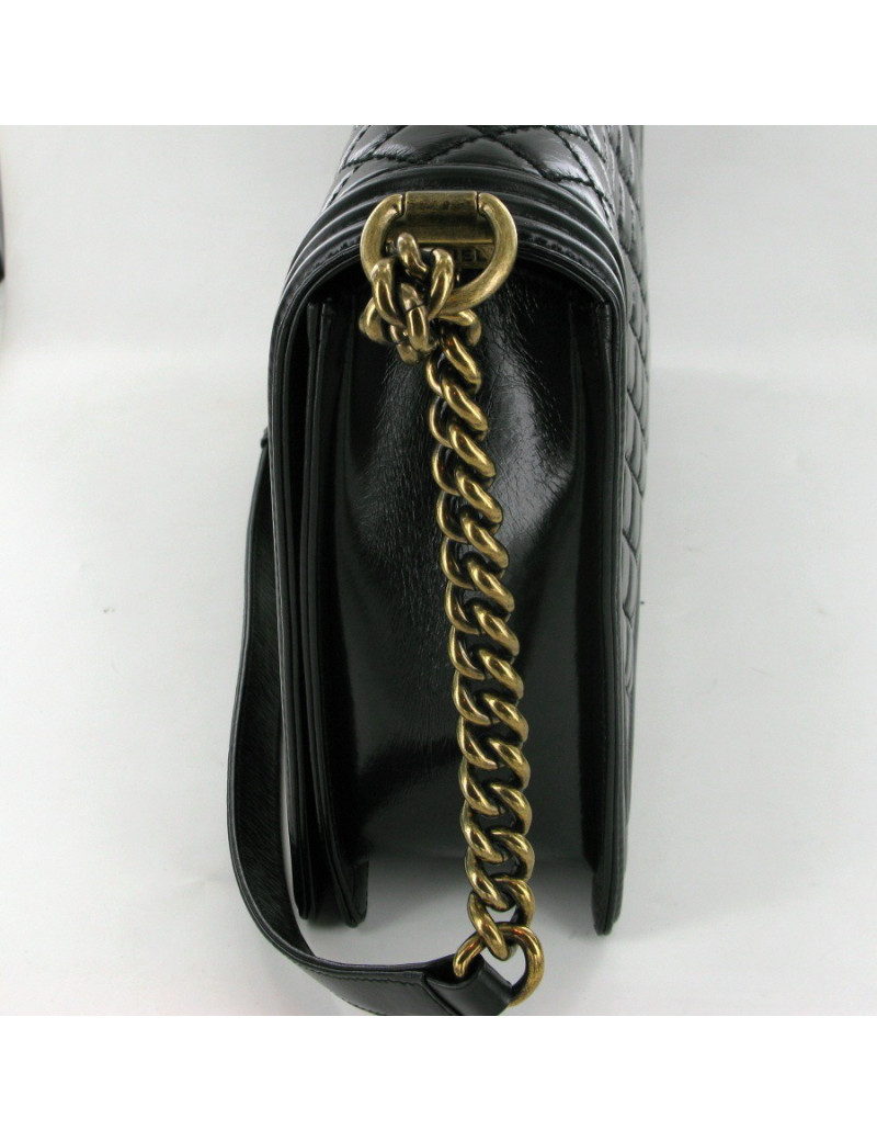 Boy GM en cuir noir brillant veilli