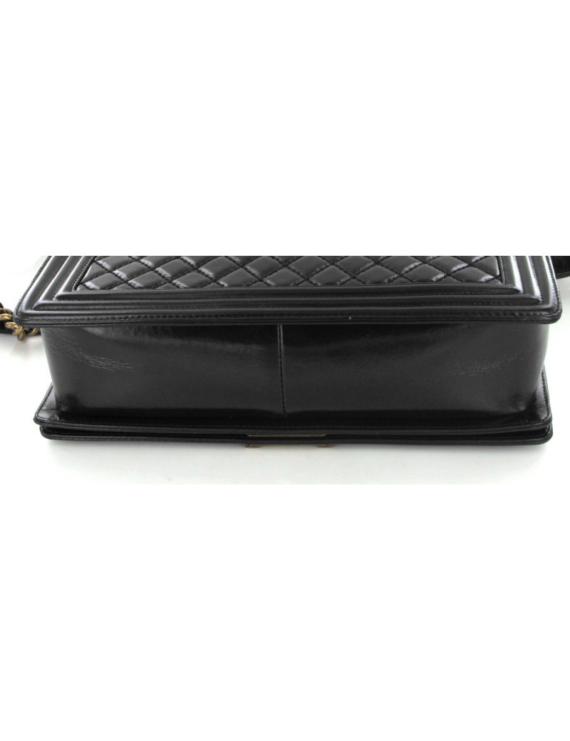 Boy GM en cuir noir brillant veilli