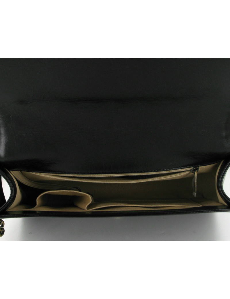 Boy GM en cuir noir brillant veilli