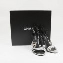 Chanel high sandals in silver python and black satin leather. Size 38.5.