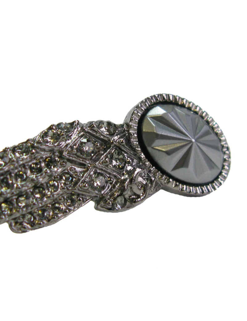 CHANEL boucle d'oreille clip aile en métal argenté vieilli et strass