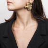 CHRISTIAN LACROIX Vintage draped shape clip-on earrings in gilded metal and Swarovski brilliants 