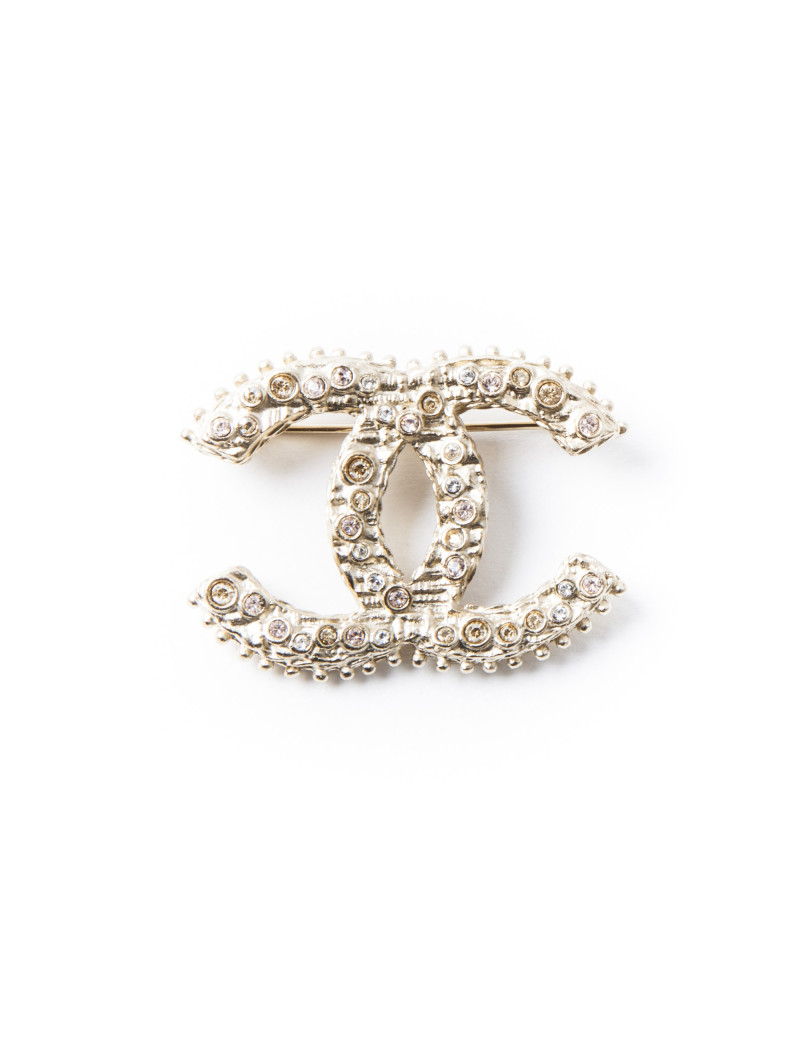 Broche dorée CHANEL double C sertie de brillants