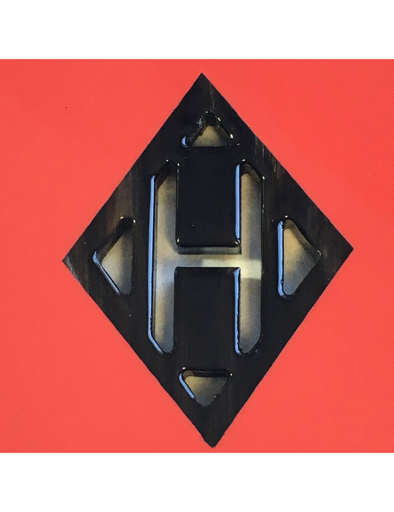 HERMES 'Kuartz' pendant in red lacquered wood and buffalo horn