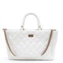 CHANEL tote bag in aged white patent leather