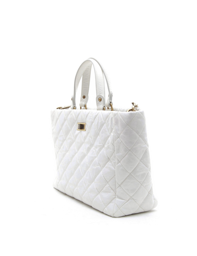 CHANEL tote bag in aged white patent leather