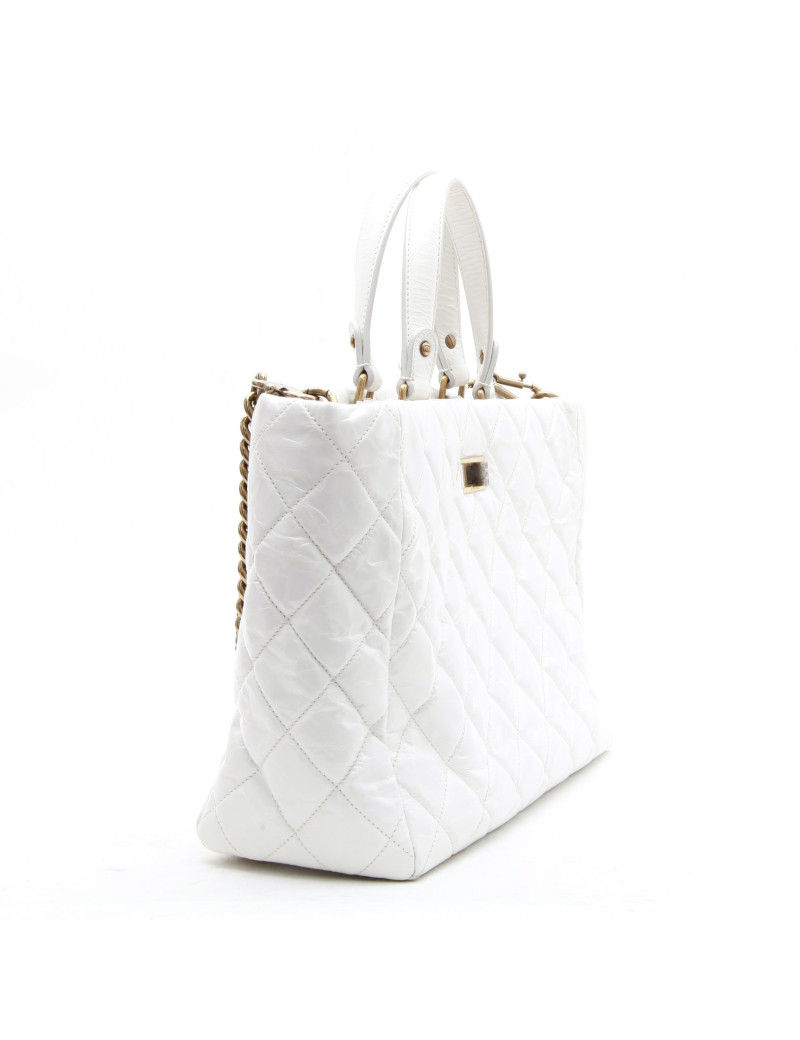 CHANEL tote bag in aged white patent leather