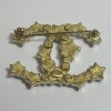 CHANEL CC brooch in gilded metal, pearls and stars