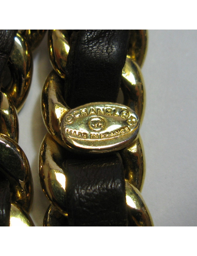 CHANEL vintage gold chain belt interlaced with brown leather.