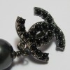 Boucles d'oreilles clips Chanel perles noires
