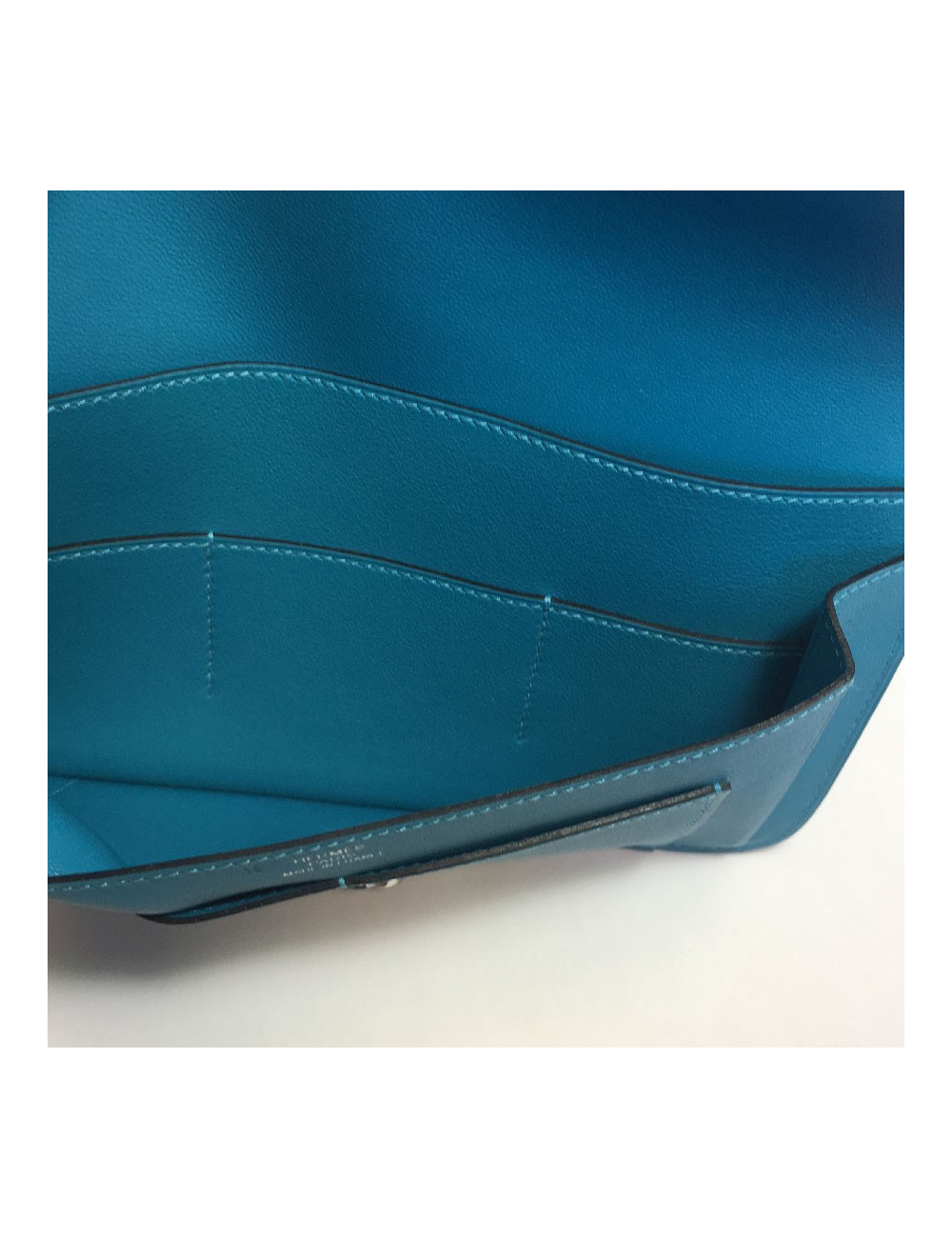 Portefeuille Dogon Duo HERMES grand modèle en veau swift turquoise