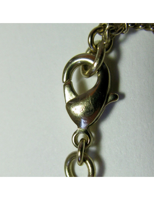 CHANEL pendant necklace in gilded metal and molten glass