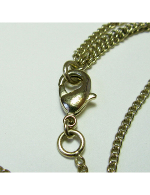 CHANEL pendant necklace in gilded metal and molten glass