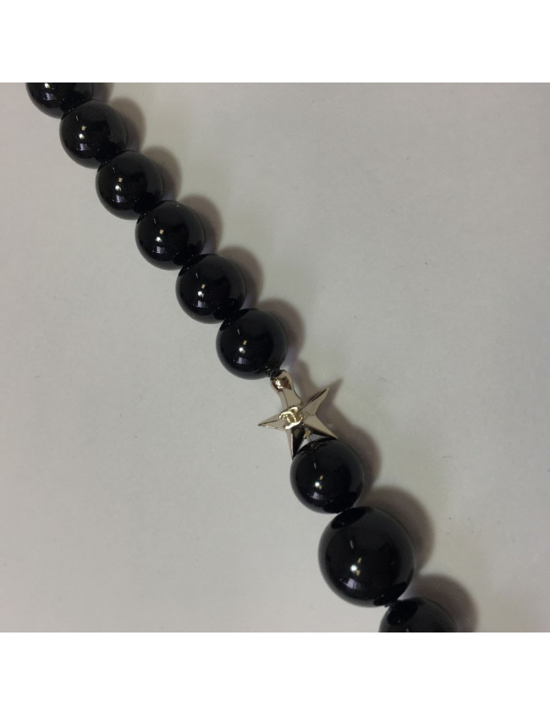 CHANEL Long necklace in black pearls, golden CC and stars