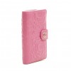  CHANEL wallet in pink embossed leather