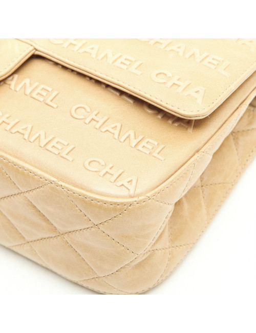 Sac CHANEL cuir d'agneau embossé "CC CHANEL" beige