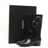 CHANEL rain boots with camellias in black rubber size 38FR