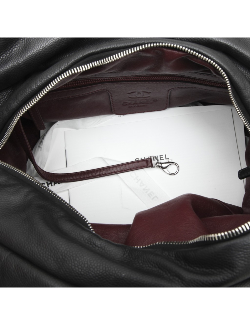 CHANEL 'Cocoon' bag in black quilted grained leather