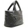 CHANEL 'Cocoon' bag in black quilted grained leather