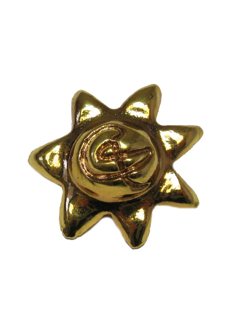 Broche CHRISTIAN LACROIX soleil en résine dorée vintage