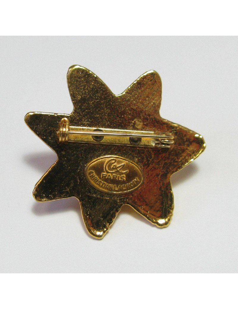 Broche CHRISTIAN LACROIX soleil en résine dorée vintage