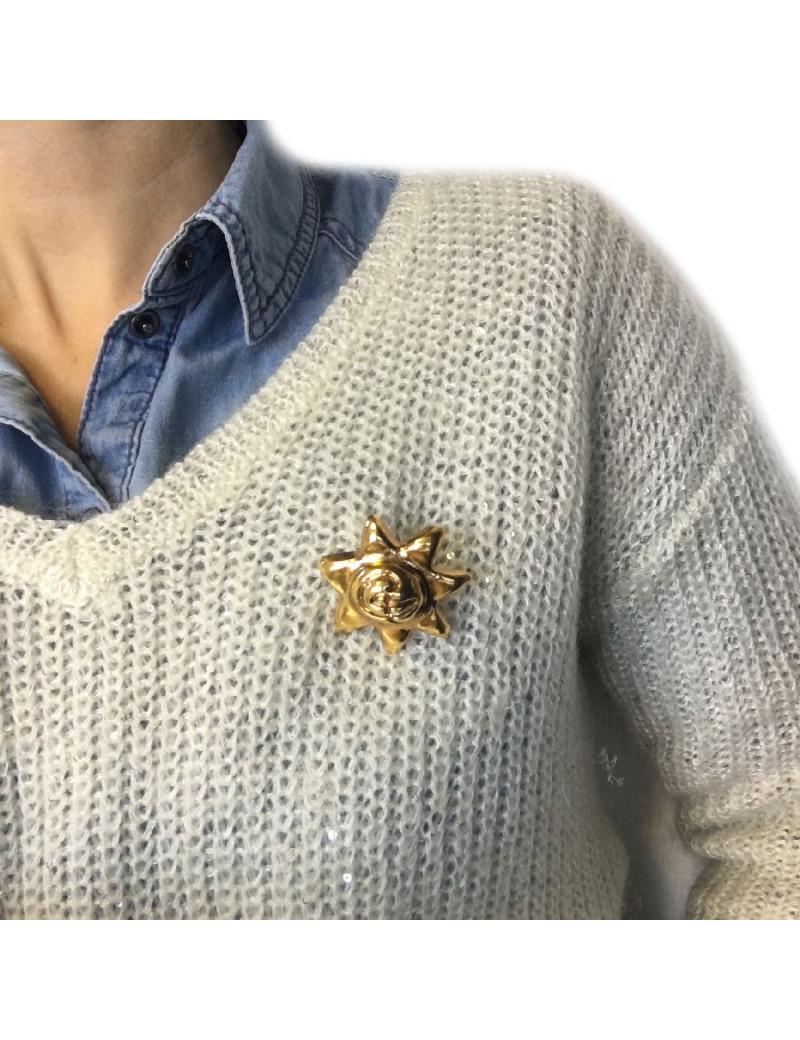 Broche CHRISTIAN LACROIX soleil en résine dorée vintage