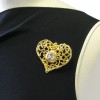 CHRISTIAN LACROIX heart brooch in gilded metal and white rhinestone