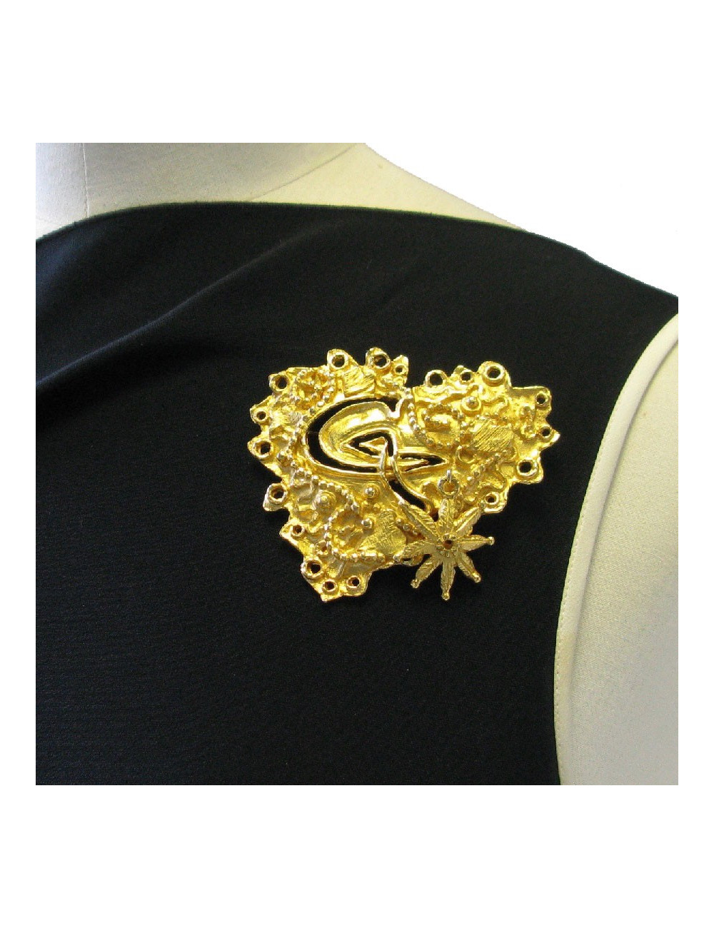 Broche CHRISTIAN LACROIX en métal doré