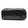 CHANEL large tote bag in black semi-gloss leather