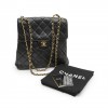 CHANEL bag in black quilted smooth lamb leather