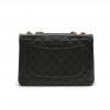 CHANEL jumbo flap bag in black grained leather