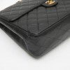 CHANEL jumbo flap bag in black grained leather