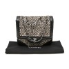 CHANEL flap bag in padded foal calfskin leather and black leather