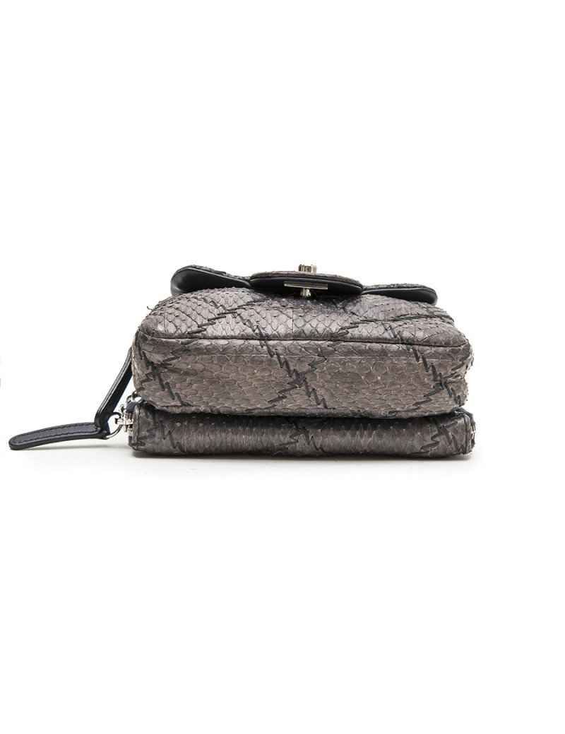 CHANEL mini quilted flap bag in a gradient of purple freshwater snake leather