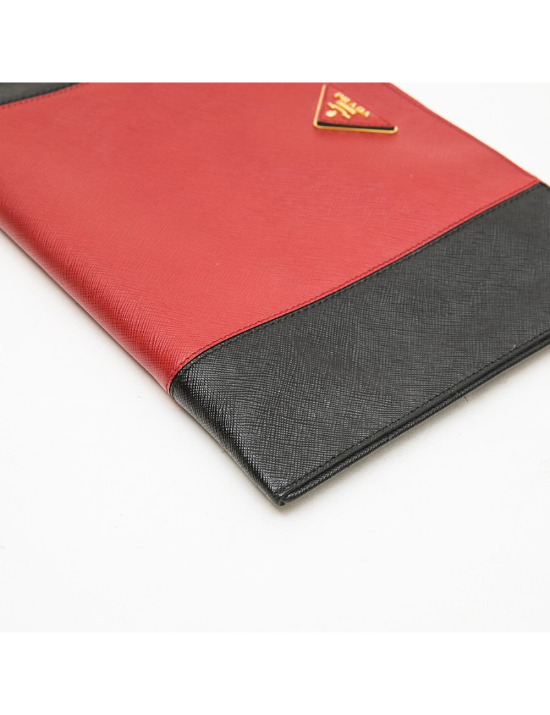 PRADA clutch in black and red grained leather