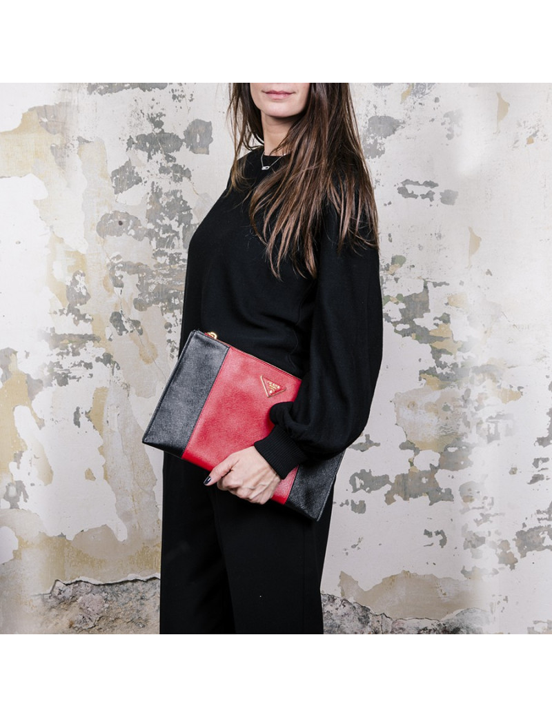 PRADA clutch in black and red grained leather