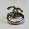 CHANEL CC ring in silver metal set with colored rhinestones
