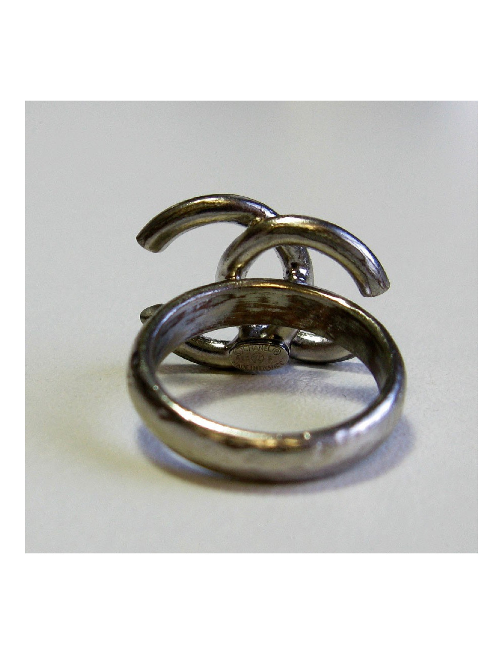 CHANEL CC ring in silver metal set with colored  rhinestones