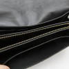 LOUIS VUITTON clutch in black grained leather with saddle stitching