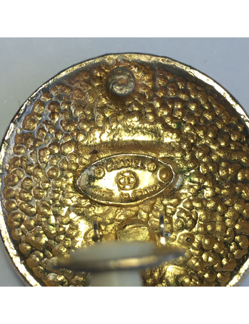 Boucles d'oreilles clips CHANEL vintage en métal doré