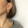 Boucles d'oreilles clips CHANEL "étoile" corail