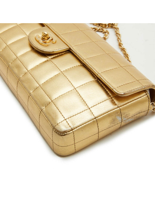 Sac Couture baguette CHANEL cuir matelassé or