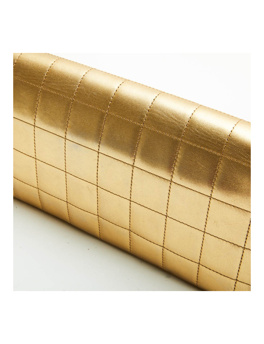 Sac baguette CHANEL cuir matelassé doré