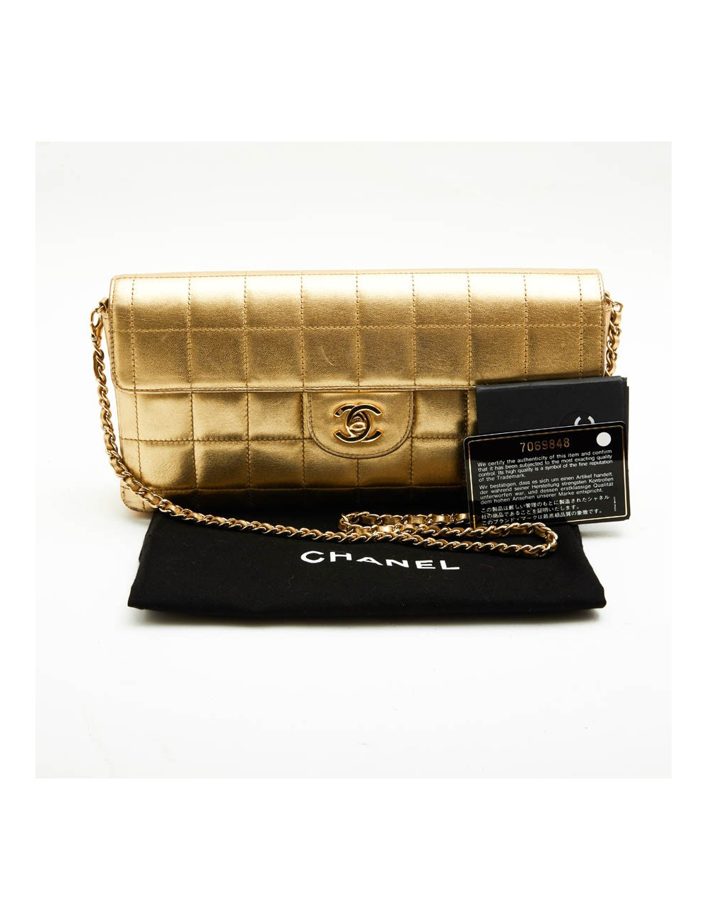 Sac Couture baguette CHANEL cuir matelassé or